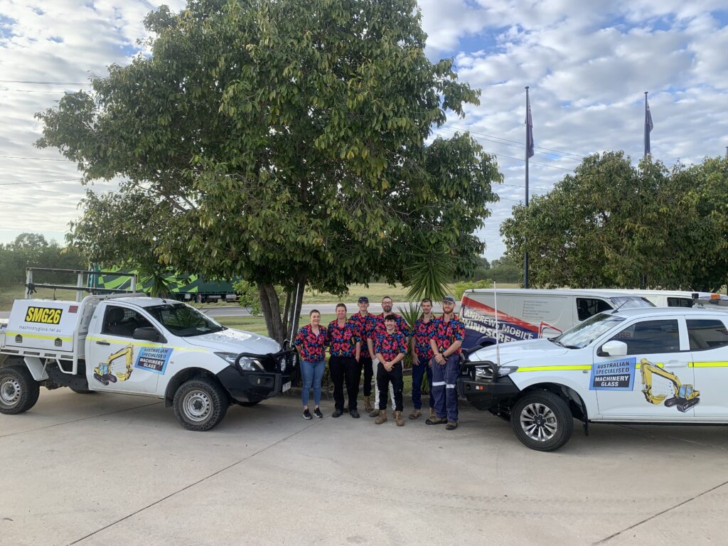 Australian Specialised Machinery Glass team photo with vehicles